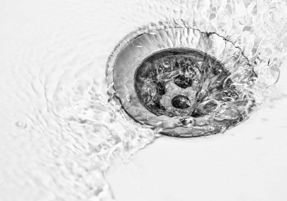 clean water draining down sink drain